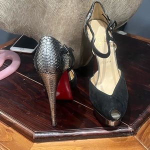 Selling a pair of Christian Louboutin peep toe shoes